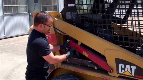 316d skid steer raising arms when machine doesent run|can't get arms to raise up on my CAT skid steer .